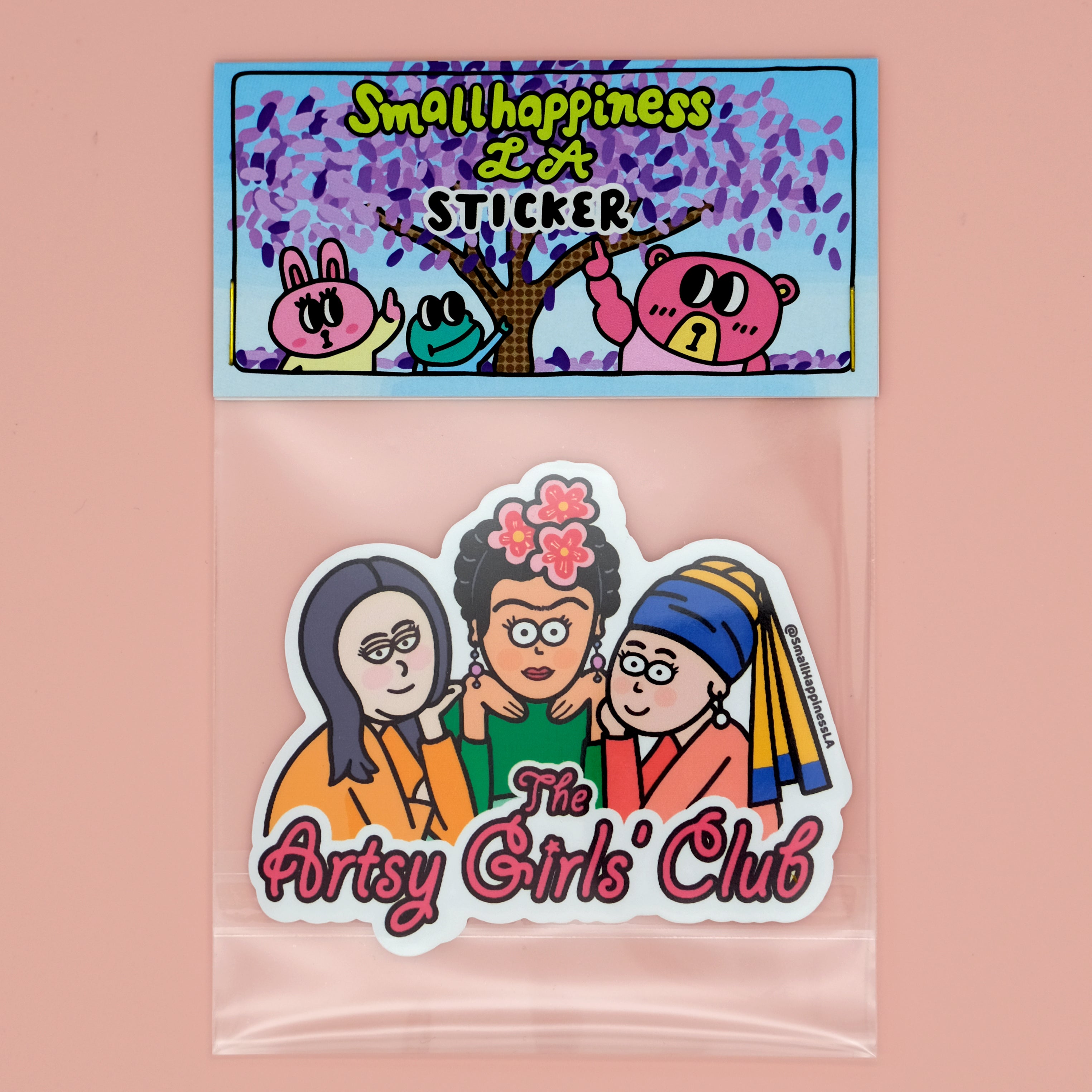 Artsy Girls Club vinyl sticker placed in clear plastic bag with SmallHappinessLA folded card head, featuring cartoon versions of iconic women artists, including Mona Lisa, Frida Kahlo, and Girl with a Pearl Earring, on a pink background