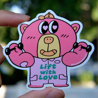Boba Bear Workout vinyl sticker featuring a pink bear lifting dumbbells, shown held by hand in natural daylight, designed by SmallHappinessLA