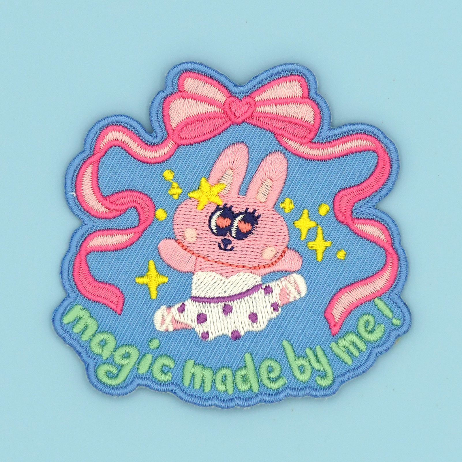 Bunny Ballet iron-on embroidery patch/sticker displayed against a baby blue background by SmallHappinessLA