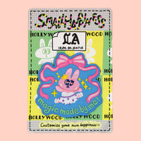 Bunny ballet iron-on embroidery patch on custom designed backing card by SmallHappinessLA, displayed against a rose pink background
