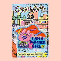 Planner girl embroidery sticker on graffiti backing card, displayed against a rose pink background.
